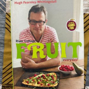 Used Book - River Cottage FRUIT Everyday - Hugh Fearnley Whittingstall - Photographs By Simon Wheeler - River Cottage Fruit Everyday is a masterful celebration of nature's sweetness. Hugh Fearnley-Whittingstall transforms seasonal fruit into versatile, vibrant dishes, proving they belong in more than just dessert. With Simon Wheeler’s lush photography, this book is an inspiring, practical guide to bringing fresh, wholesome flavors into every single meal.
