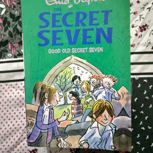 Used Book - Enid Blyton - Good Old Secret Seven - Hachette India - Good Old Secret Seven is a quintessential mystery that showcases Enid Blyton’s gift for building suspense. When a strange visitor at Torling Castle sparks a new investigation, the Seven’s teamwork shines. It’s a classic, atmospheric adventure that highlights the importance of observation, courage, and the enduring bond of friendship.