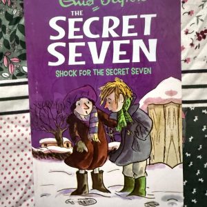 Used Book - Enid Blyton - Shock For The Secret Seven - Hachette India - Shock for the Secret Seven is a riveting turning point that tests the group’s resolve like never before. When internal friction threatens to disband the society, Blyton masterfully raises the stakes with a gritty kidnapping case. It’s a bold, emotionally resonant mystery that proves true friendship can survive any crisis.