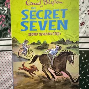 Used Book - Enid Blyton - Secret Seven Mystery - Hachette India - Blyton at her best! Secret Seven Mystery is a masterclass in middle-grade suspense, blending clever sleuthing with the cozy charm of the Society’s meetings. When a schoolgirl goes missing, the stakes feel real, keeping young readers hooked. It’s an empowering, timeless adventure that champions teamwork, logic, and pure childhood wonder.