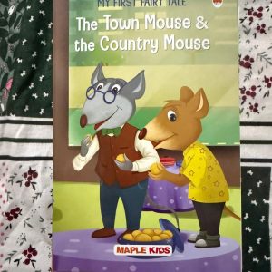 Used Book - My First Fairy Tale - The Town Mouse & The Country Mouse - Maple Kids - My First Fairy Tale: The Town Mouse & The Country Mouse by Maple Kids is a charming, beautifully illustrated introduction to a timeless fable. Perfectly tailored for young readers, its vibrant pages and simple storytelling gently teach the value of peace and contentment, making it a delightful addition to early libraries.