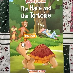 Used Book - Moral Stories - The Hare And The Tortoise - Maple Kids - Moral Stories: The Hare and the Tortoise by Maple Kids is a brilliant, beautifully illustrated reimagining of a timeless classic. Through vibrant pages and engaging storytelling, it masterfully teaches young minds that patience and determination triumph over arrogance, making this essential lesson in perseverance both delightfully fun and unforgettable.