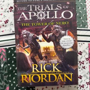 Second Hand Book - The Tower of Nero - Rick Riordan - Epic World3 - Legendary Adventures - Return To Percy Jackson's World - The Trials of Apollo - The Tower of Nero is a spectacular, high-stakes finale to Rick Riordan’s The Trials of Apollo series. Returning to Manhattan for a thrilling final showdown, it brilliantly balances heart-pounding danger, laugh-out-loud humor, and deep emotional resonance. Apollo’s transformative journey concludes beautifully, making this legendary adventure an unforgettable masterpiece.