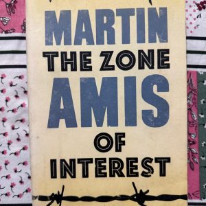 Second hand book - THE ZONE OF INTEREST - MARTIN AMIS - A breathtaking, chillingly audacious masterpiece. Martin Amis bravely confronts humanity’s darkest chapter through an unflinching, brilliantly satirical lens. By examining the mundane horrors of Auschwitz from the inside, *The Zone of Interest* delivers an unforgettable, profoundly moving, and razor-sharp psychological exploration. A powerful, monumental addition to world literature.