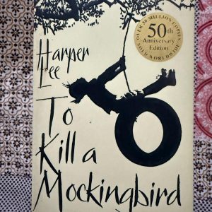Used Book - To Kill A Mocking Bird - Harper Lee - A towering masterpiece of American literature, To Kill a Mockingbird explores the profound complexities of race, justice, and human empathy. Through the innocent eyes of Scout Finch, Harper Lee delivers a deeply moving, beautifully written story that challenges conscience and celebrates moral courage. It remains a timeless, unforgettable classic.