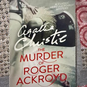 Used Book - Agatha Christie - The Murder Of Roger Ackroyd - A Classic Hercule Poirot Mystery - A absolute masterpiece of golden-age crime fiction, The Murder of Roger Ackroyd showcases Agatha Christie at the peak of her powers. Ingenious, atmospheric, and brilliantly paced, it delivers the ultimate jaw-dropping twist that permanently redefined the detective genre. Hercule Poirot has never been sharper—a must-read classic.