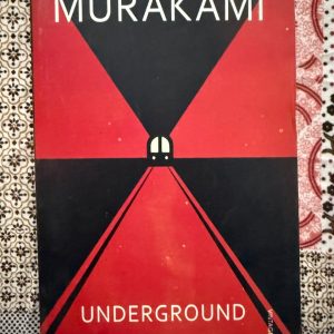 Used Book - MURAKAMI - UNDERGROUND - A haunting and deeply empathetic masterpiece, Underground showcases Haruki Murakami’s brilliant journalistic side. By weaving together raw, firsthand interviews with survivors and perpetrators of the Tokyo gas attack, he exposes the psychological fractures of modern society. It is a powerful, compassionate, and chillingly profound exploration of trauma, memory, and human resilience.