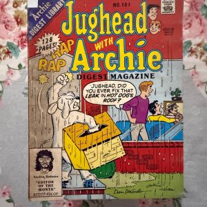 Used Book - Jughead With Archie – Jughead Comics Digest Magazine is a hilarious tribute to Riverdale’s premier burger-loving nonconformist. Bursting with classic adventures, crown-wearing antics, and his trademark sarcastic wit, this pocket-sized powerhouse delivers double the laughs. It is a delightfully charming read that perfectly celebrates the ultimate lazy genius and his timeless comic escapades.