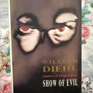 Used Book - William Diehl - Show of Evil (Hardbound) - William Diehl’s Show of Evil is a gripping, high-octane psychological thriller that masterfully resurrects the terrifying brilliance of Martin Vail and Aaron Stampler. Filled with razor-sharp courtroom drama, shocking twists, and intense suspense, this hardbound edition delivers a dark, unputdownable journey into the very depths of human depravity.