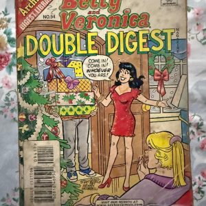 Second hand Book - Betty & Veronica - Double Digest - Betty & Veronica Double Digest serves up a double helping of Riverdale’s premier friendship and rivalry. Filled with twice the fashion, dating dilemmas, and classic humor, it perfectly captures the enduring bond between the ultimate girl-next-door and the glamorous heiress. It is a vibrant, pocket-sized goldmine of timeless, feel-good fun.