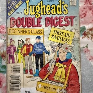 Second hand Book - Jughead's Double Digest Magazine - Jughead Double Digest is a masterclass in comic relief, perfectly capturing Riverdale’s favorite food-loving, crown-wearing cynic. Packed with double the classic mishaps, burger-craving escapades, and his brilliant, lazy-genius wit, it’s a delightfully lighthearted read. This pocket-sized treasure chest guarantees laugh-out-loud entertainment for comic fans of all generations.