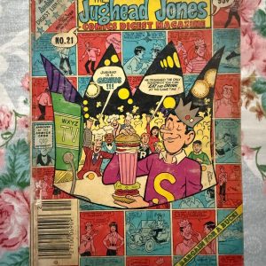 Second hand Book - Jughead Jones Comics Digest Magazine - Vintage Edition - Jughead Jones Comics Digest Magazine is a hilarious tribute to Riverdale’s premier burger-loving nonconformist. Bursting with classic adventures, crown-wearing antics, and his trademark sarcastic wit, this pocket-sized powerhouse delivers double the laughs. It is a delightfully charming read that perfectly celebrates the ultimate lazy genius and his timeless comic escapades.