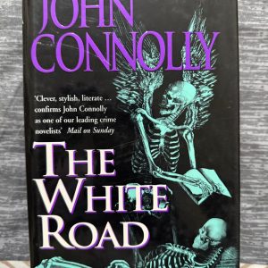 Used Book - John Connolly - The White Road - The White Road is a masterful display of John Connolly’s dark, atmospheric storytelling. Blending visceral horror with a deeply emotional narrative, it finds Charlie Parker at his most vulnerable. It is a haunting, relentless journey into the human psyche that cements Connolly’s place as a titan of the genre. Essential reading.