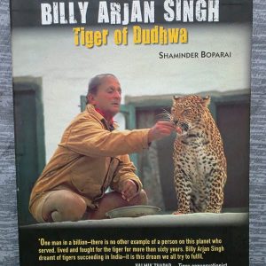 Used Book - Billy Arjan Singh - Tiger of Dudhwa - Shaminder Boparai - Harper Collins - Tiger of Dudhwa by Shaminder Boparai is a gripping, evocative portrait of Billy Arjan Singh’s pioneering conservation efforts. This compelling narrative beautifully documents his fearless commitment to saving endangered tigers and restoring the Dudhwa ecosystem. It is an inspiring testament to one man’s extraordinary dedication to wildlife and natural preservation.