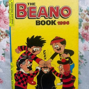 Used Book - The BEANO Annual - 1996 - A Mischievous World of Beano - The Beano Annual 1996 is an absolute masterpiece of comic mischief. Bursting with hilarious escapades from Dennis the Menace, Gnasher, and the gang, it delivers timeless humor and brilliant artwork. Packed with rebellious laughs and endless energy, this nostalgic treasure is an unmissable joy for fans of all ages!